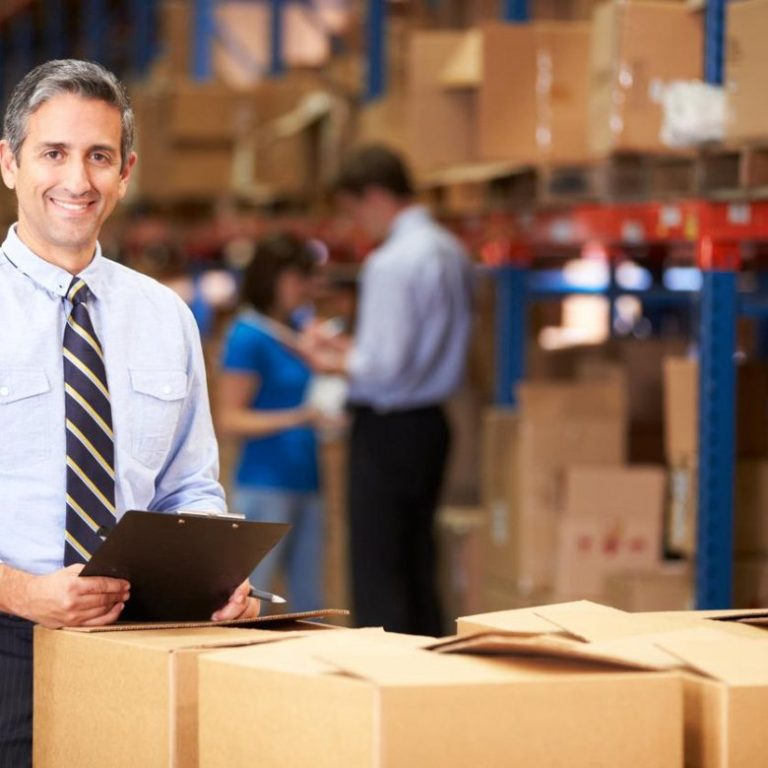 CPL team member checking parcels in the warehouse